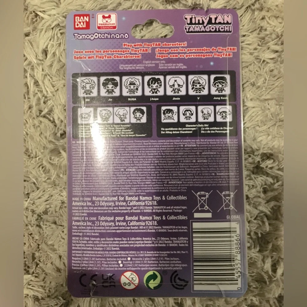 Purple Ban Dai Tiny Tan Tamagotchi.